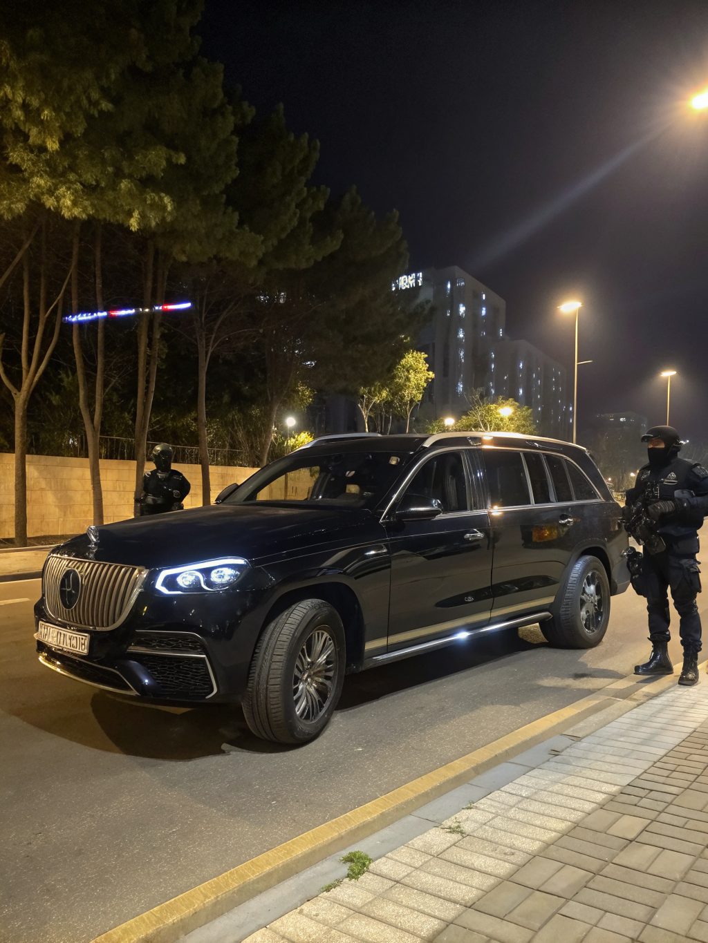 Bodyguard and security detail coordinating secure vehicle movement