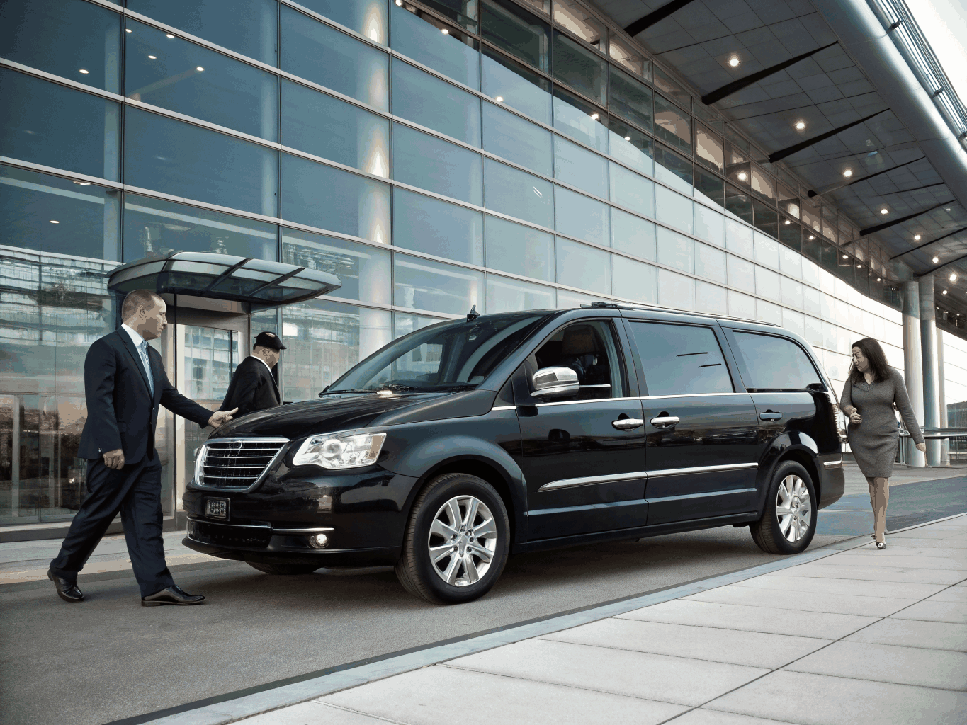 Executive passenger shuttle exterior in black finish